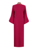 Bold Fuchsia Galabya Balances Heritage Modern