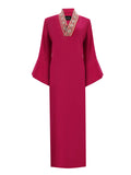 Bold Fuchsia Galabya Balances Heritage Modern