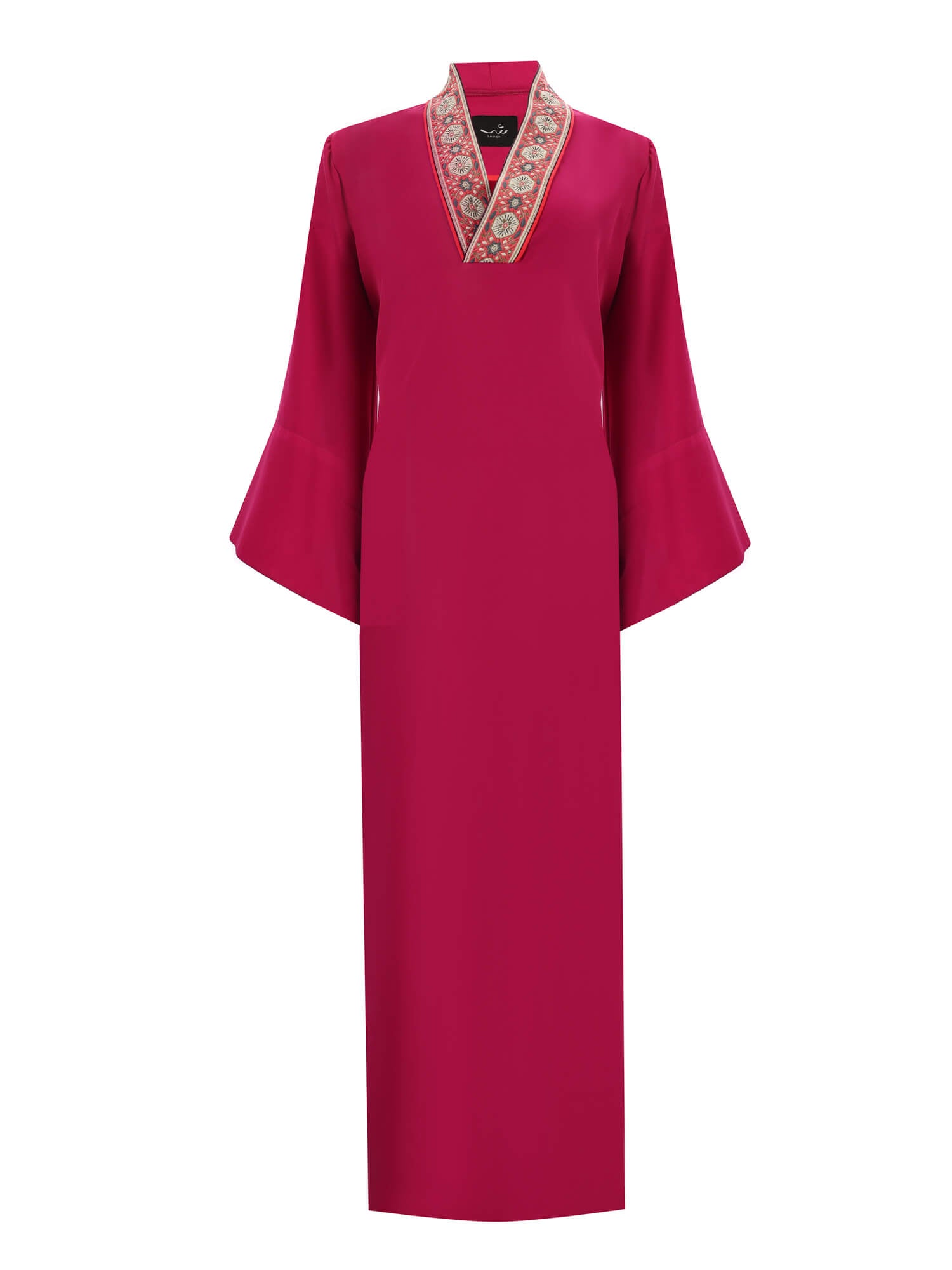 Bold Fuchsia Galabya Balances Heritage Modern