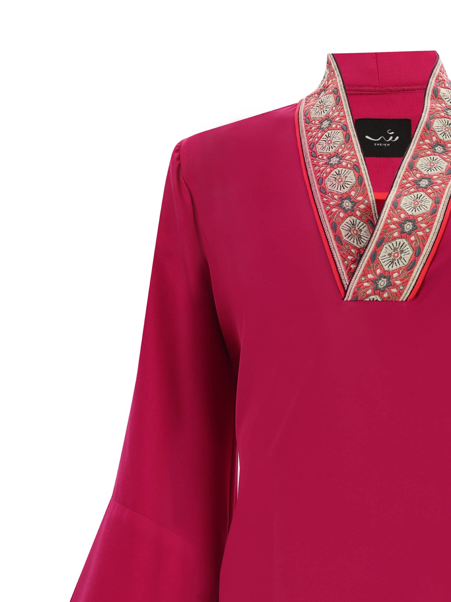 Bold Fuchsia Galabya Balances Heritage Modern