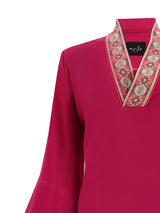 Bold Fuchsia Galabya Balances Heritage Modern