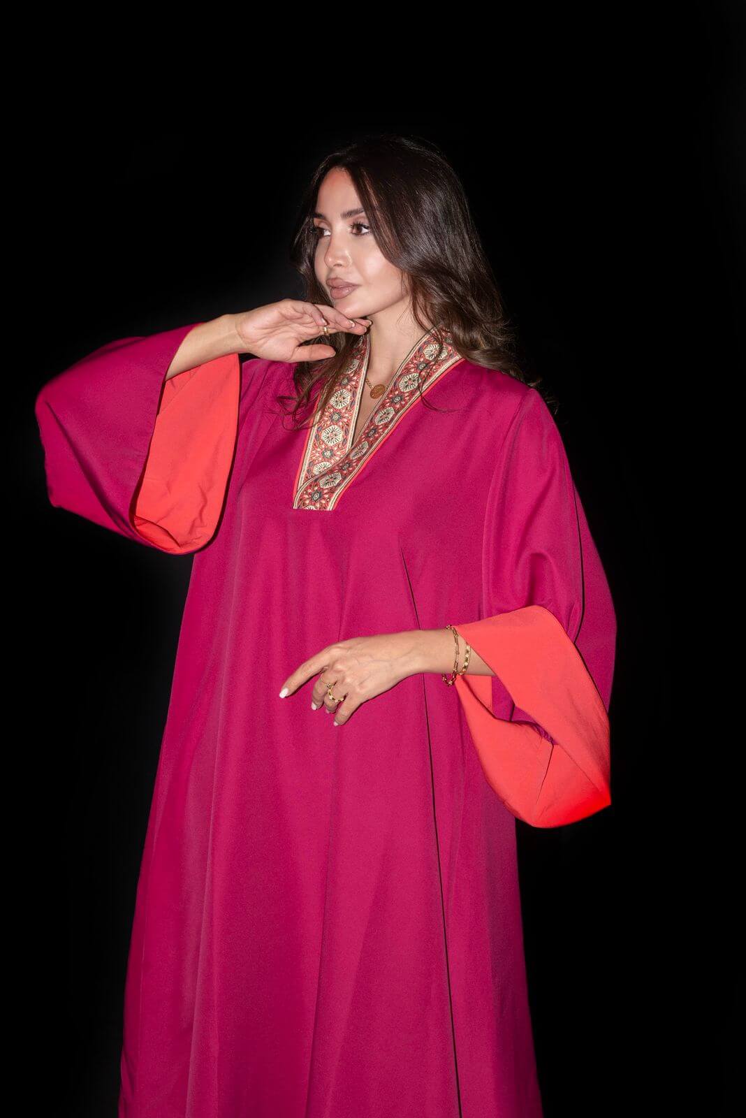 Bold Fuchsia Galabya Balances Heritage Modern