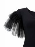 Chiara Boni La Petite Robe ruffled tulle sleeve detail — black crepe mermaid gown KSA | SO. by Sora
