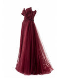 Burgundy tulle overskirt gown side view — off-shoulder formal dress Saudi Arabia | SO. by Sora