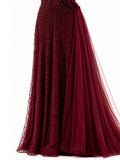 Sunburst beadwork and skirt detail — burgundy evening gown | SO. by Sora