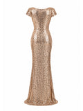 Badgley Mischka gold sequin cowl-back mermaid gown front — luxury dress Saudi Arabia | SO. by Sora